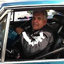 John Bender sitting in the driver seat of his 1967 Plymouth Satellite