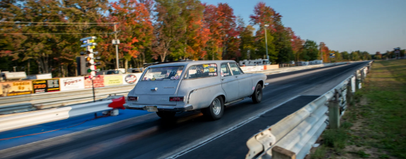 1963 440 Dodge station wagon racing down the drag strip