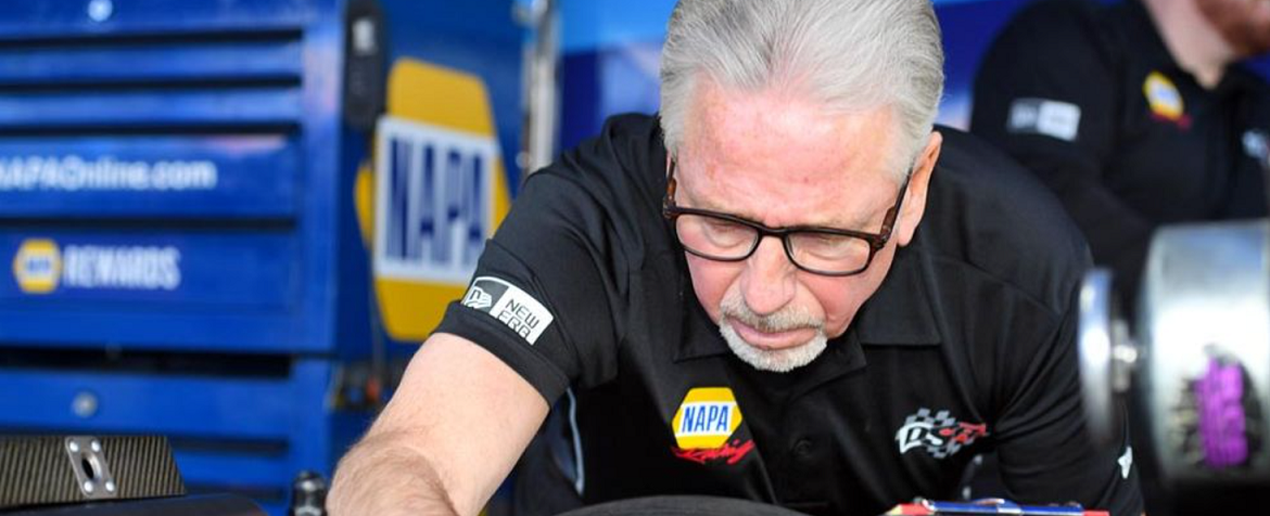 Rahn Tobler working on Ron Capps' Funny Car