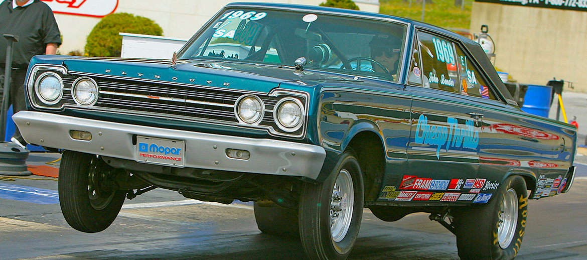 1967 Plymouth Satellite launching off the start line in a drag race