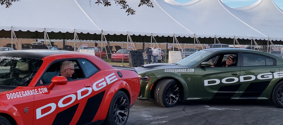 Two men in Dodge vehicles