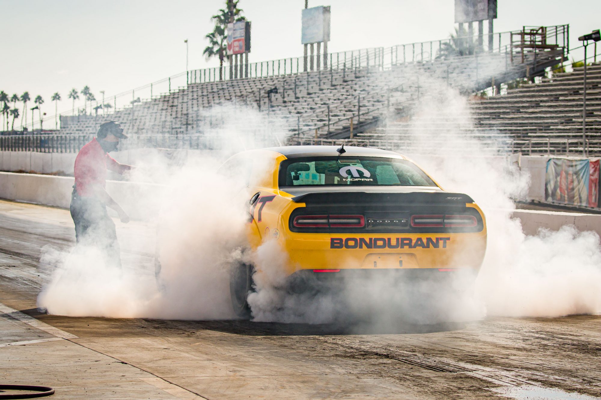 Carolyn driving at Bondurant