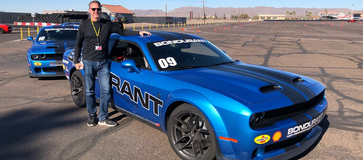 guy standing next to Bondurant Challenger