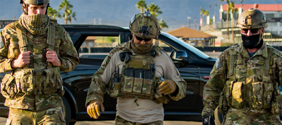 Three people in uniforms