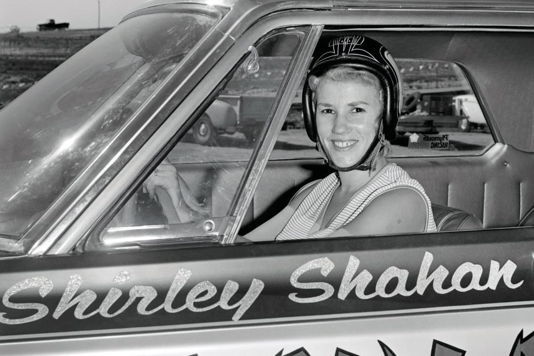 Shirley Shahan sitting in her drag car