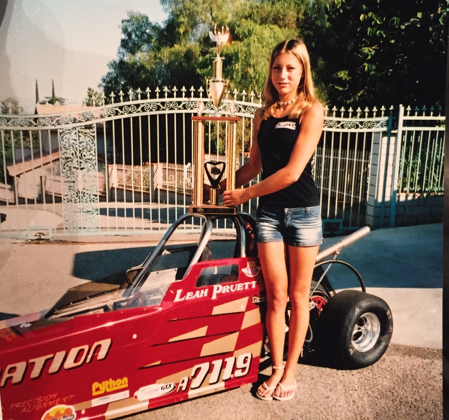 Leah Pruett posing with a trophy