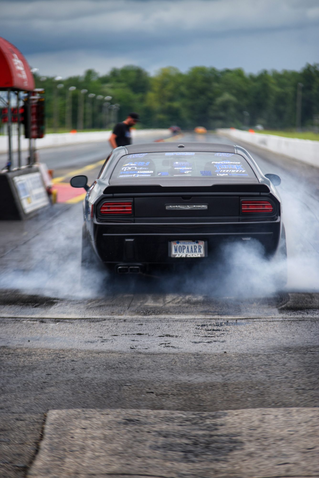 Neichaun doing a burnout before a drag race