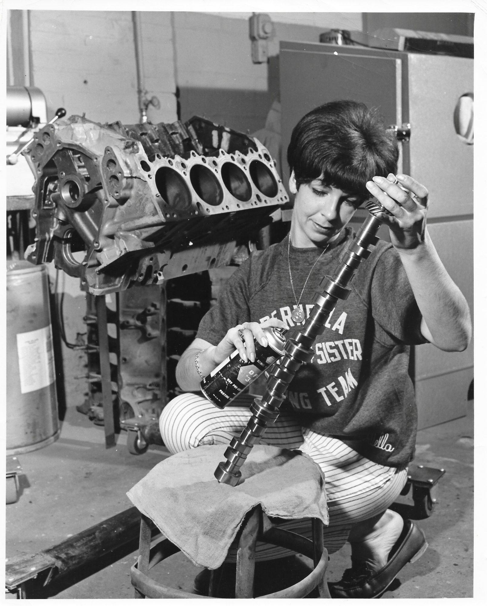 Della Woods working on a HEMI engine