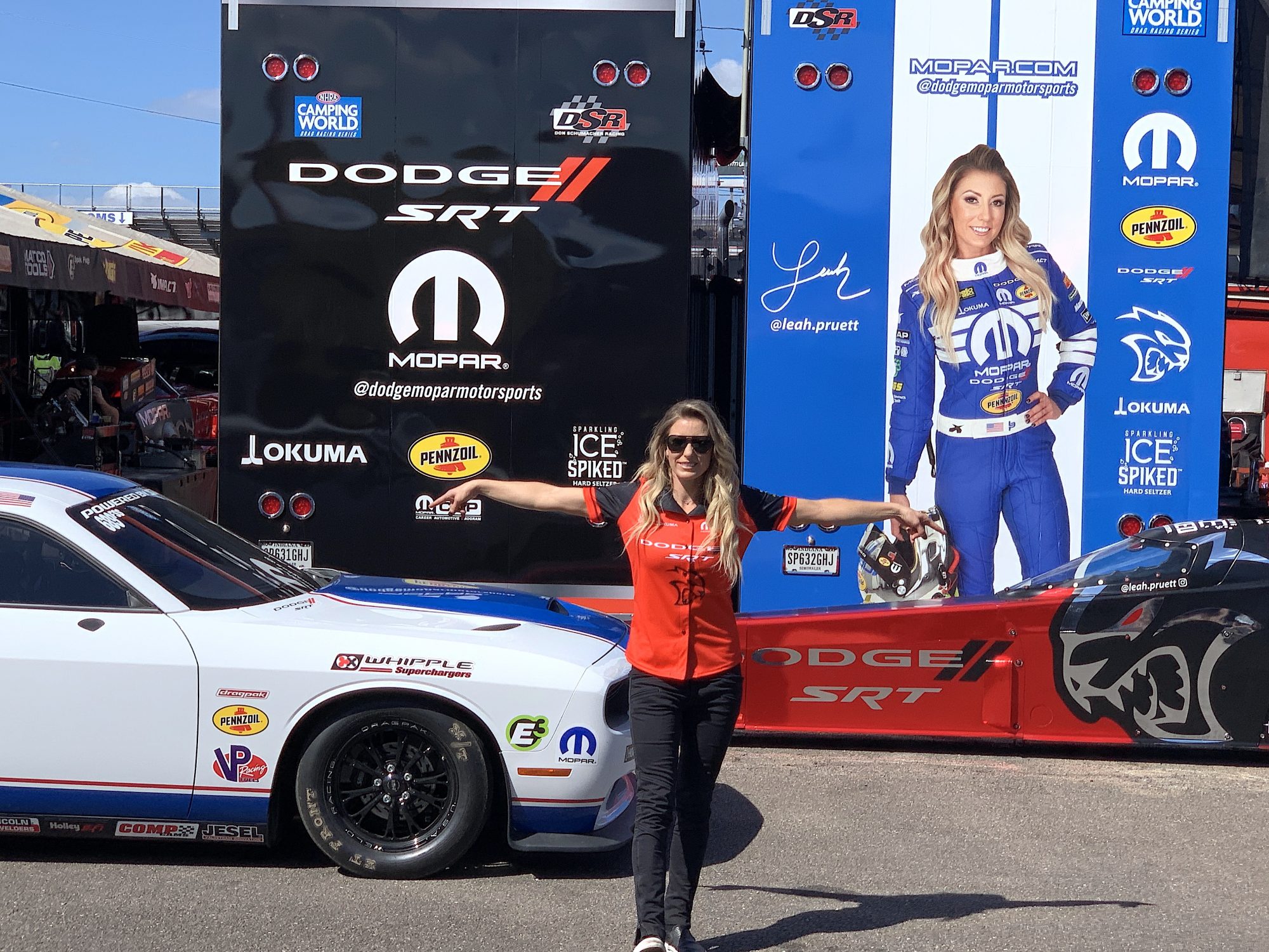 Leah posing with her Drag Pak and Top Fuel Dragster