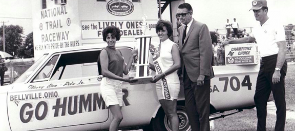 Mary Ann Foss receiving an award for drag racing