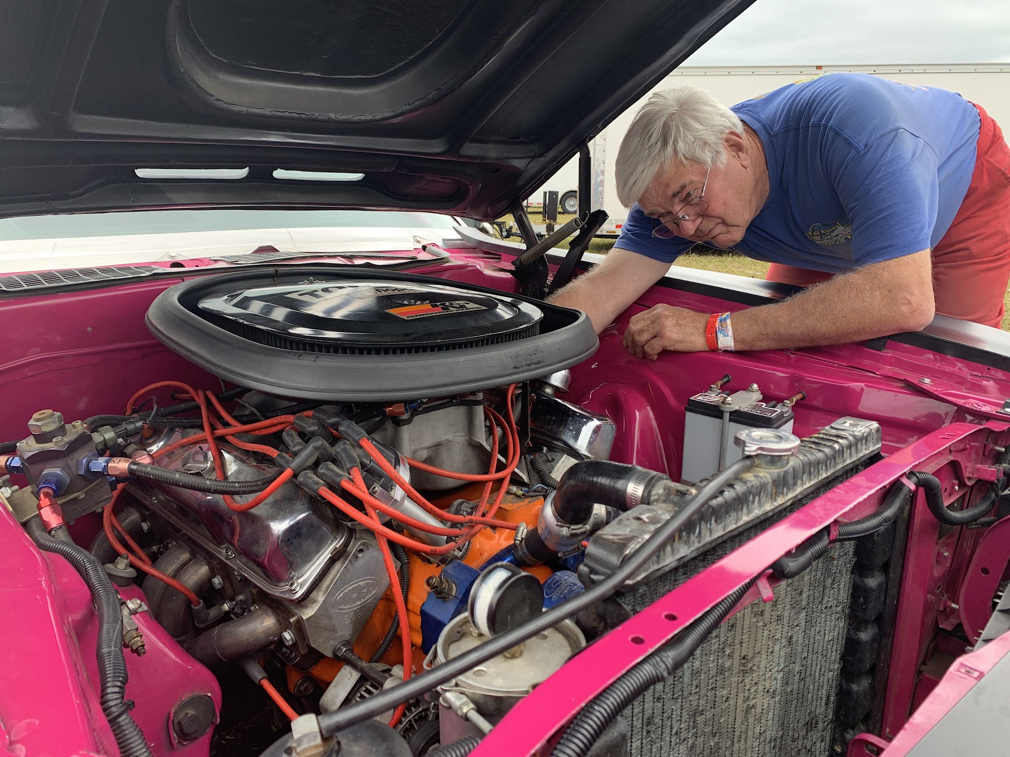 Larry Hill working on his car