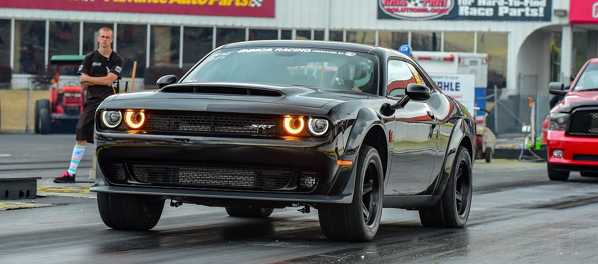 Black Challenger drag racing