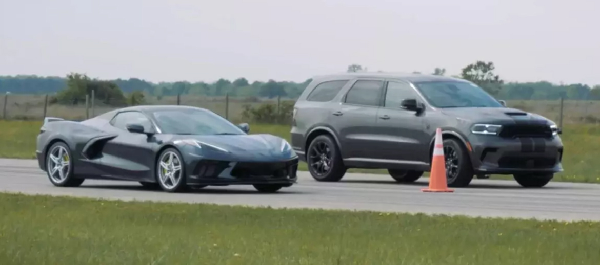 A Dodge Durango SRT Hellcat and a C8 Chevy Corvette drag racing