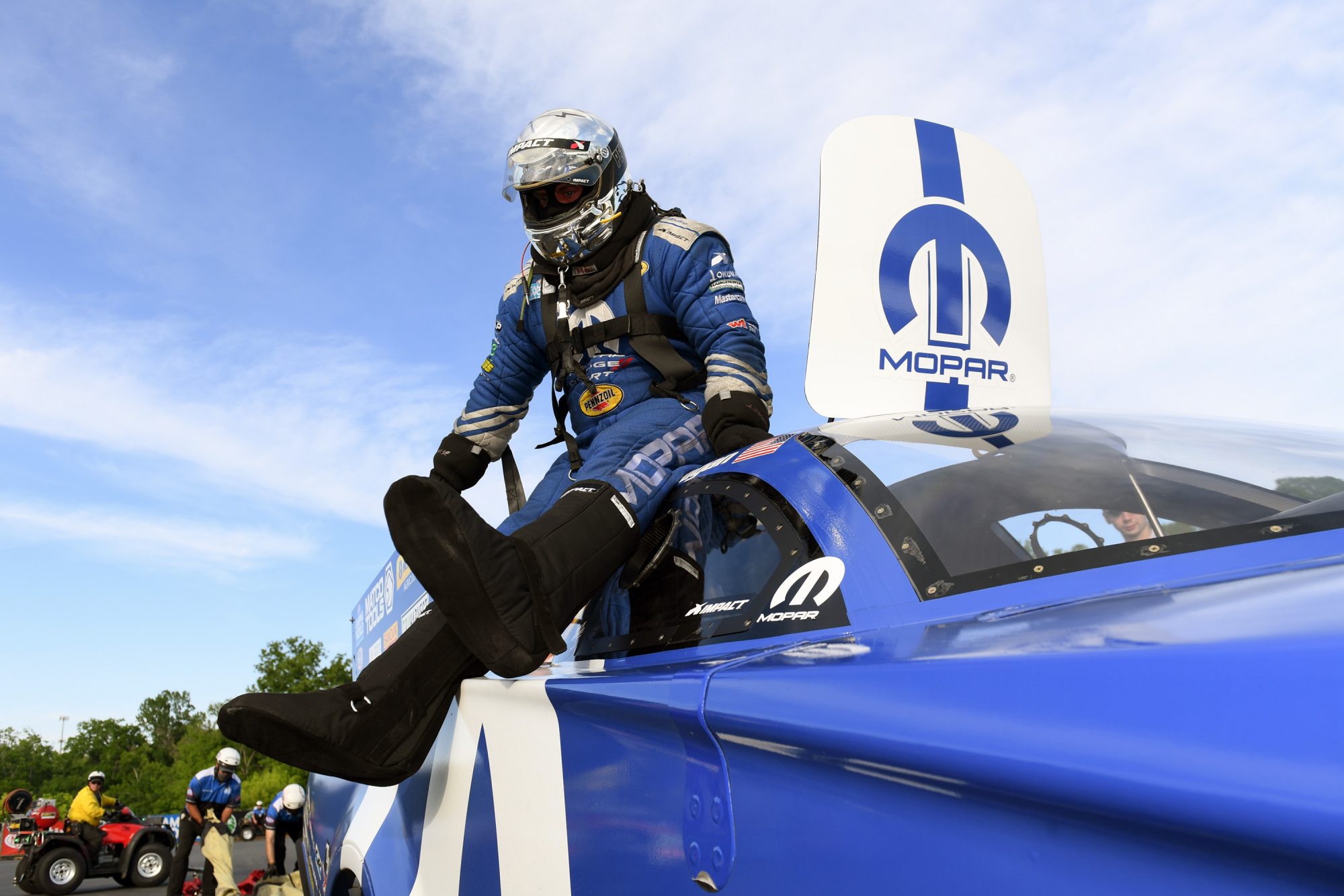 Matt Hagan sitting on top of his funny car