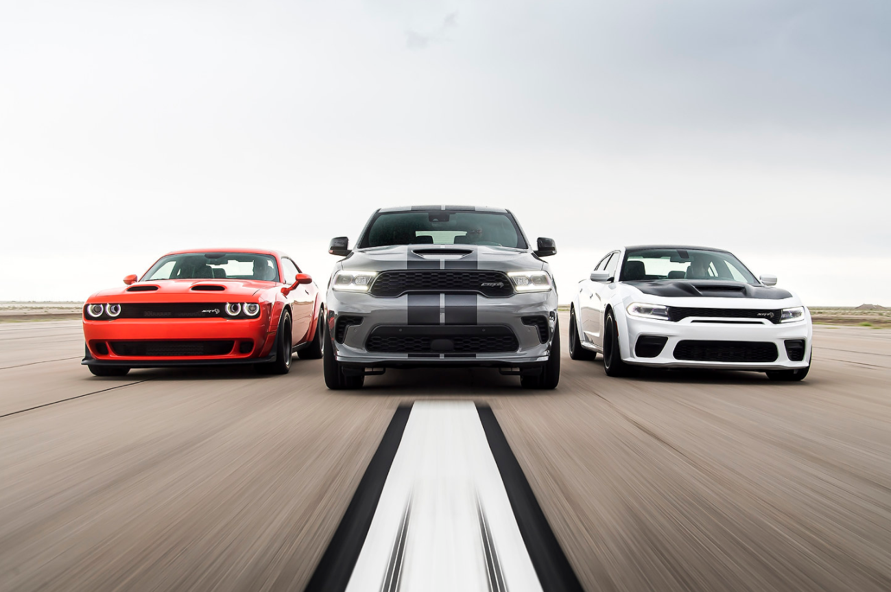 Dodge Challenger, Dodge Durango and Dodge Charger driving side by sider