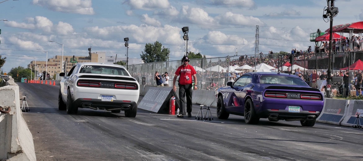 Two Dodge Challenger's Drag Racing at Roadkill Nights