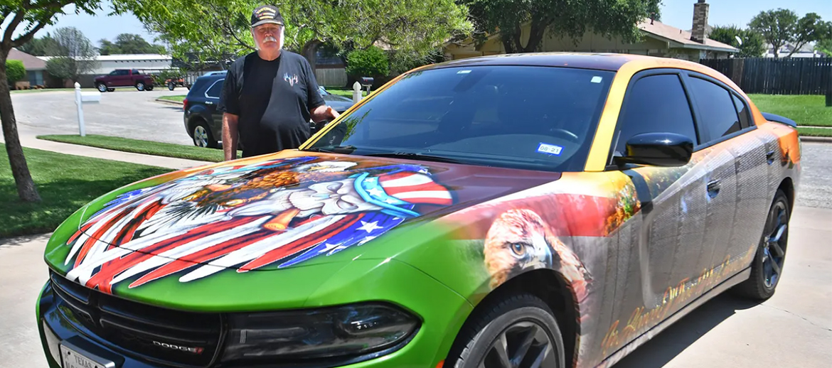 Man standing with his 2019 Dodge Charger