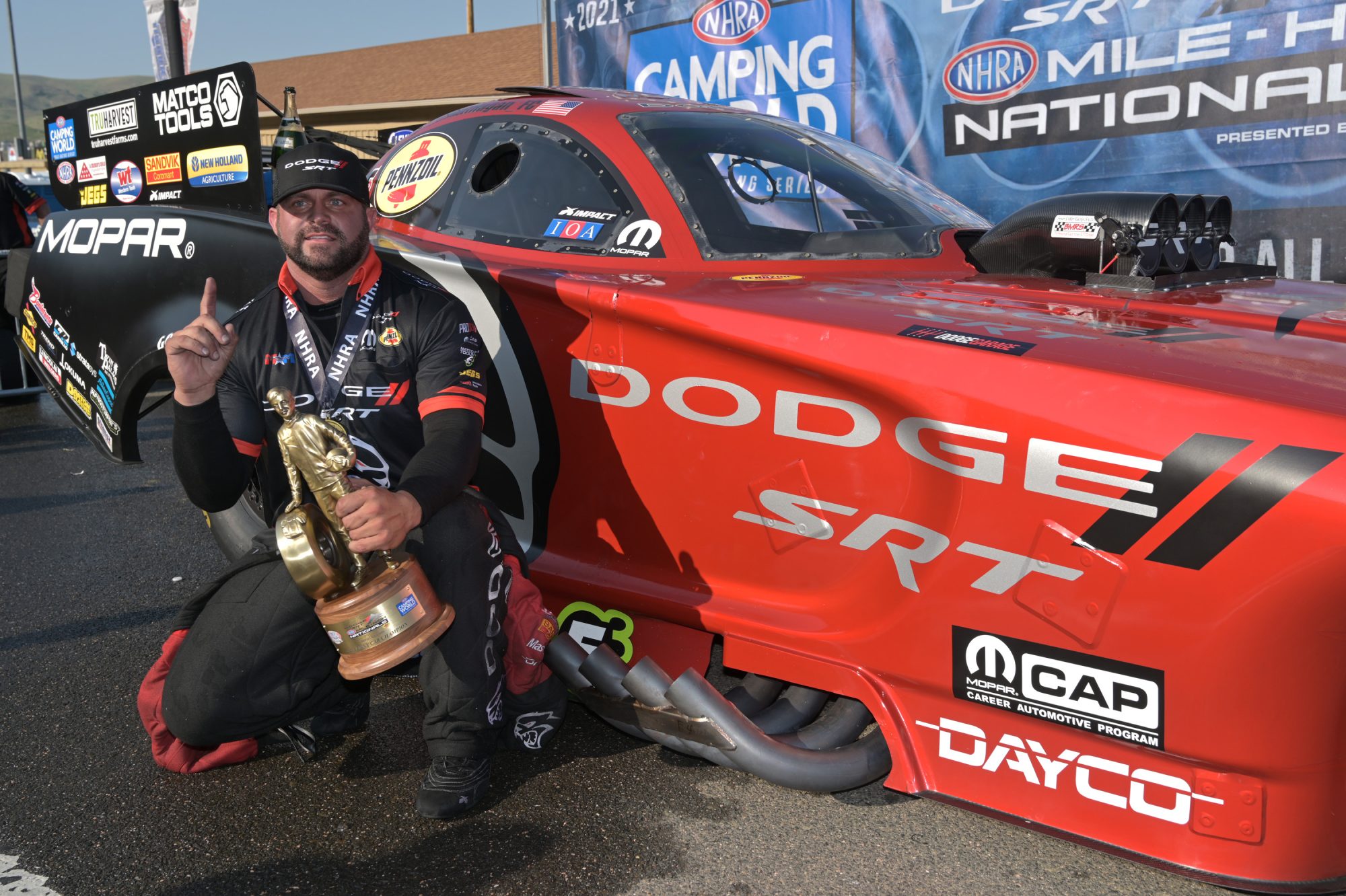 Matt Hagan holding a Wally