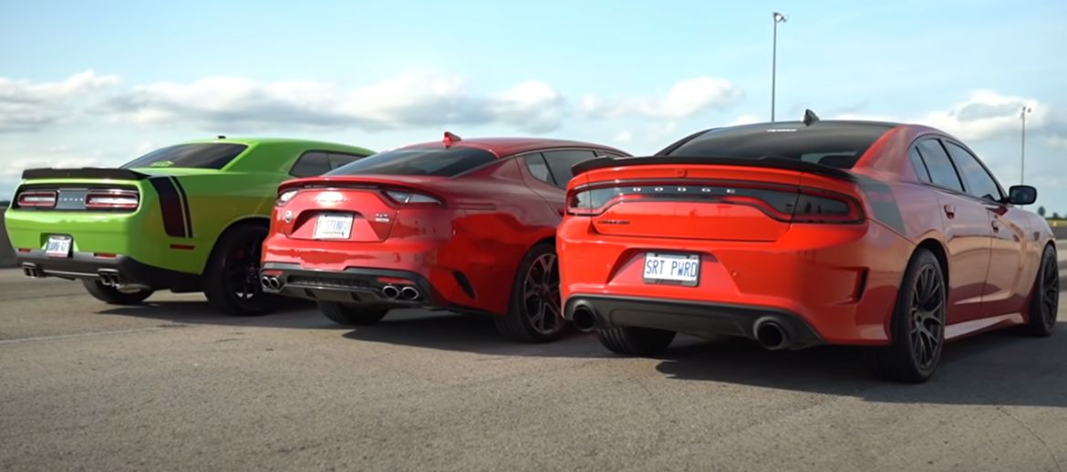 Kia Stinger GT AWD, Dodge Charger Scat Pack Daytona and a Dodge Challenger Scat Pack parked next to one another