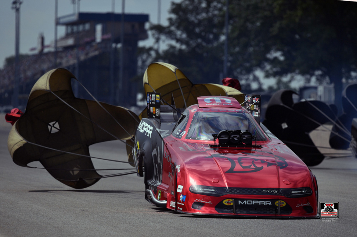 Mopar Dodge Charger SRT Hellcat Redeye Funny Car being slowed down by its parachutes