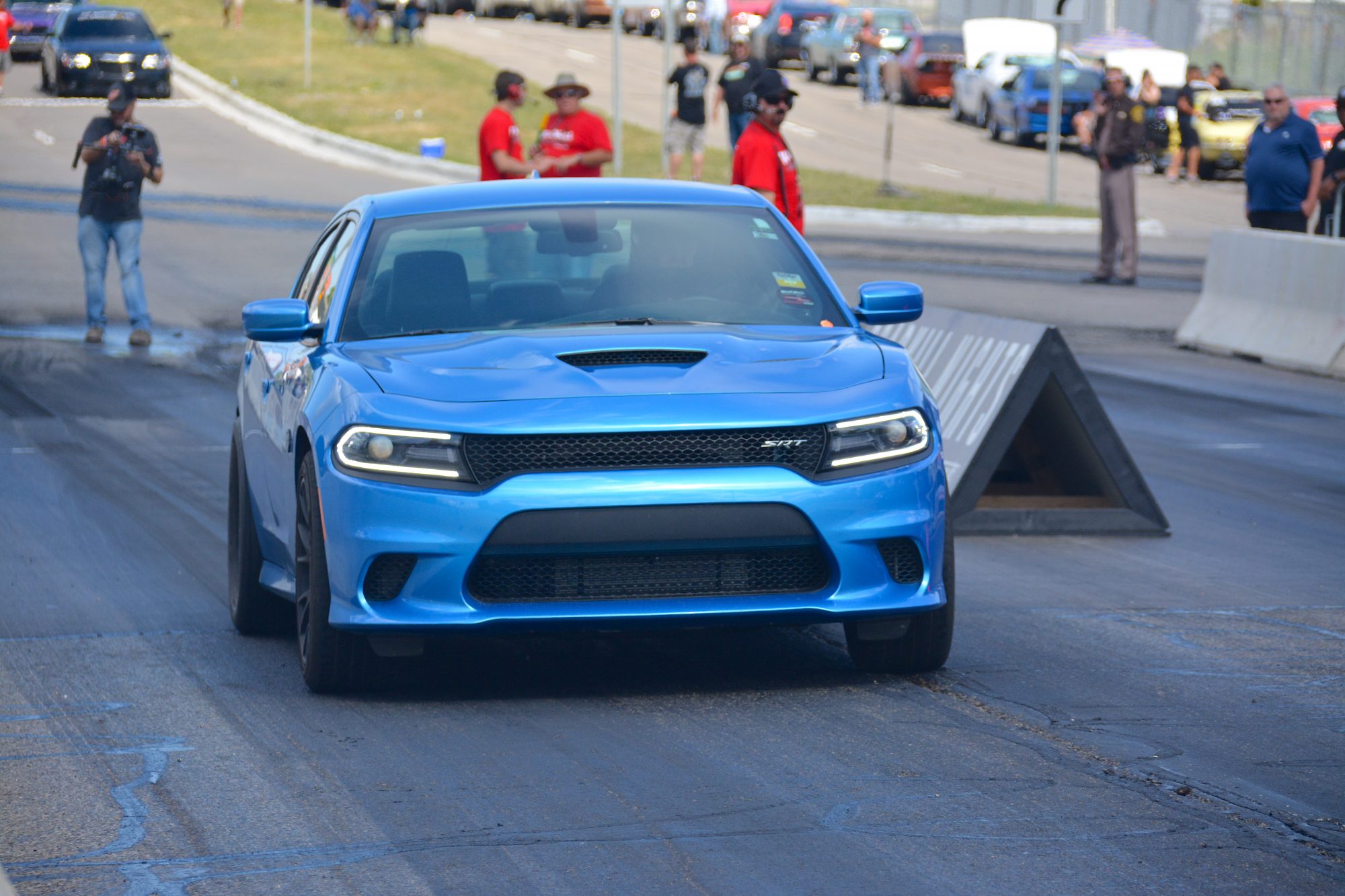 Charger drag racing at Roadkill Nights Powered by Dodge