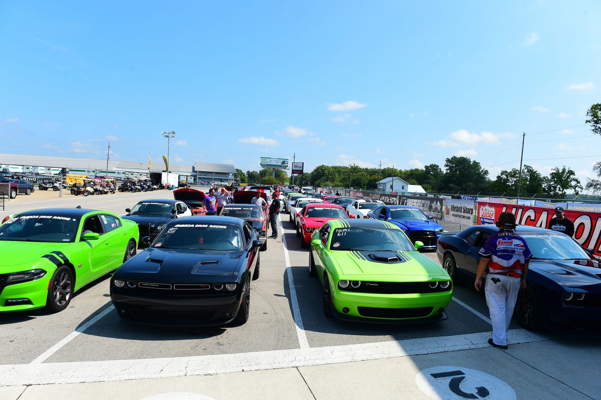 Row of cars getting ready to drag race