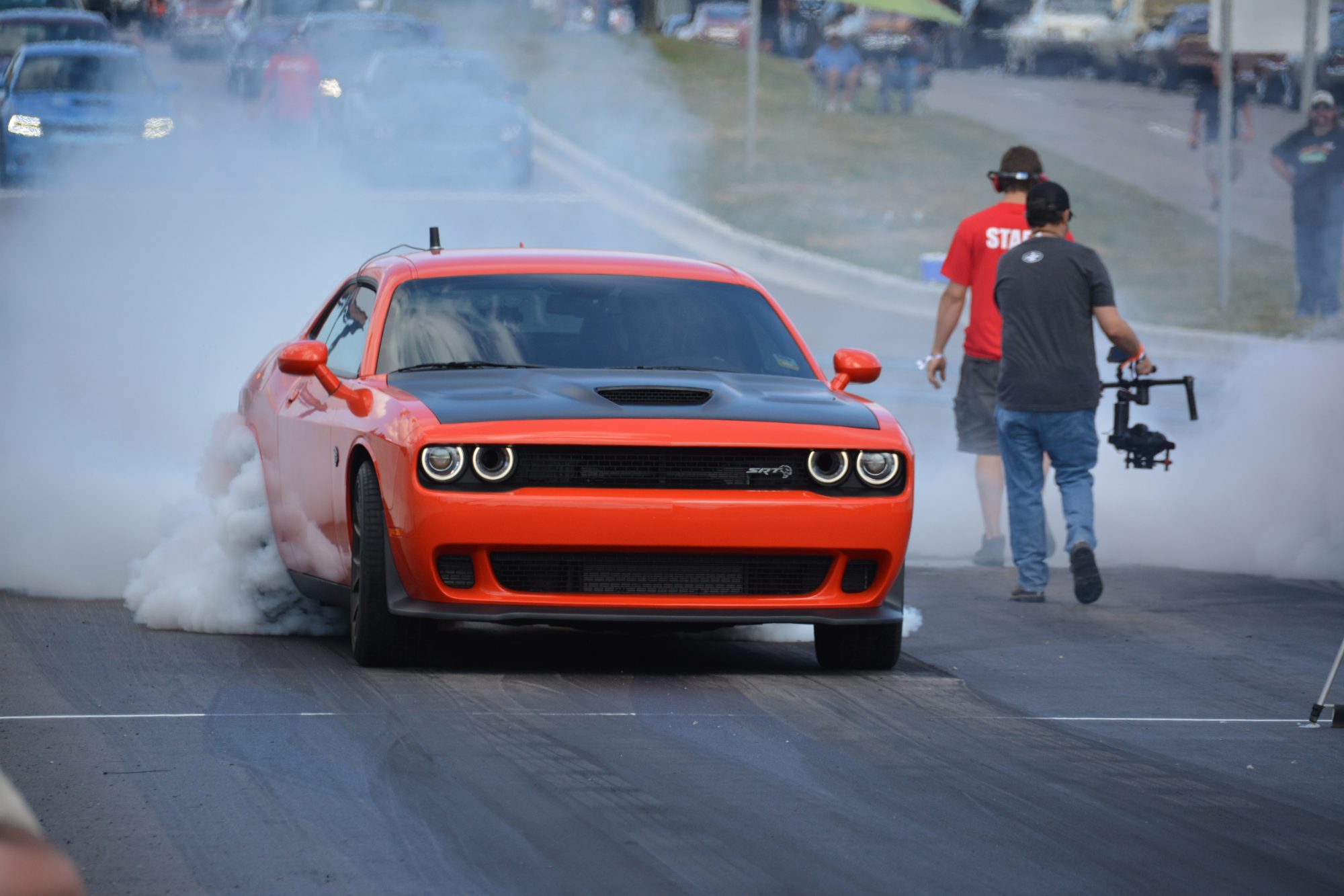 Challenger doing a burnout prior to drag racing