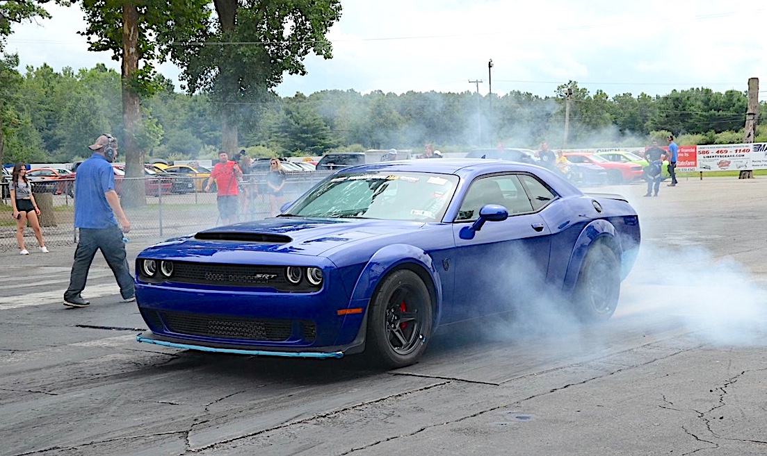 Challenger drag racing at Roadkill Nights Powered by Dodge