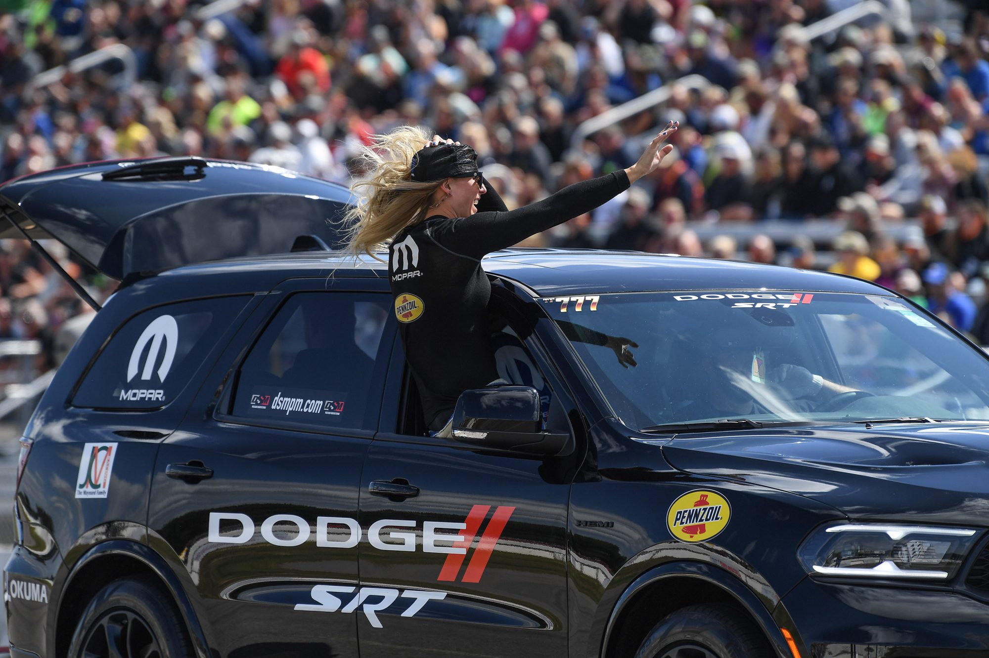 Leah Pruett waving to fans