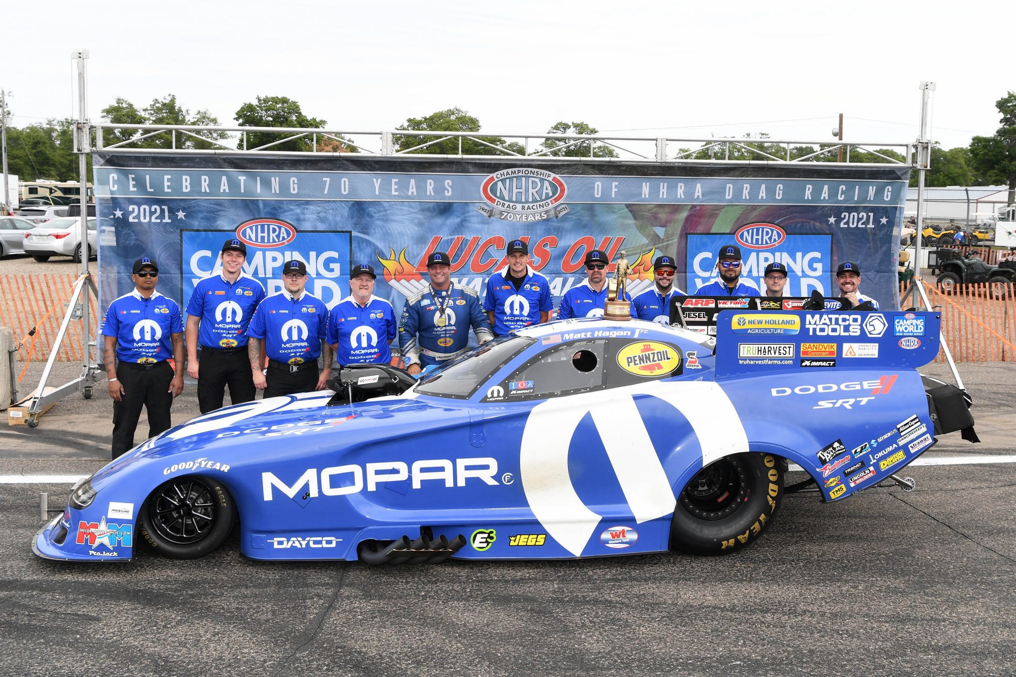 Matt Hagan and his crew posing with the Wally