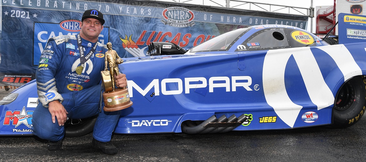 Matt Hagan holding his Wally