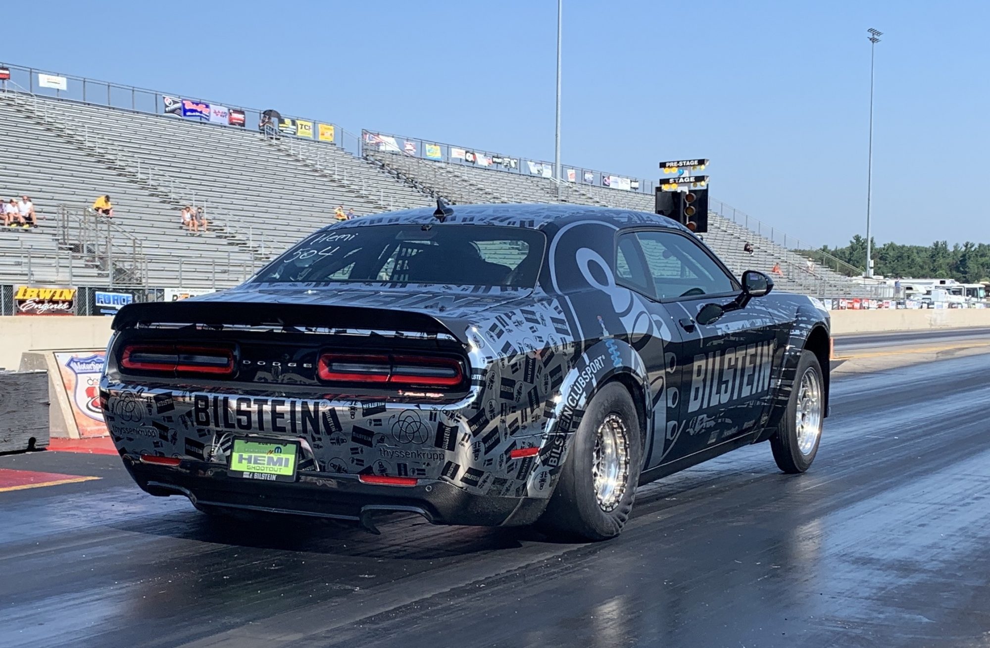 Dodge vehicle on the starting line of a drag strip