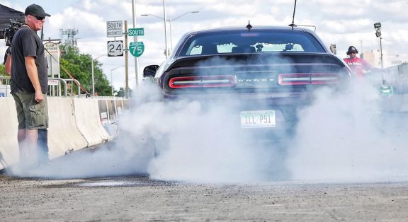 Challenger doing a burnout at Roadkill Nights Powered by Dodge