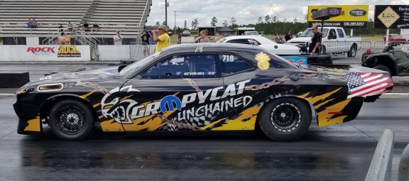 Dodge Challenger on the starting line of a drag strip