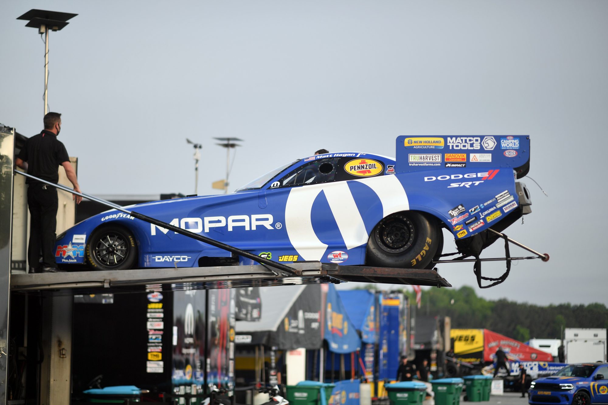 Matt Hagan's car coming off the trailer