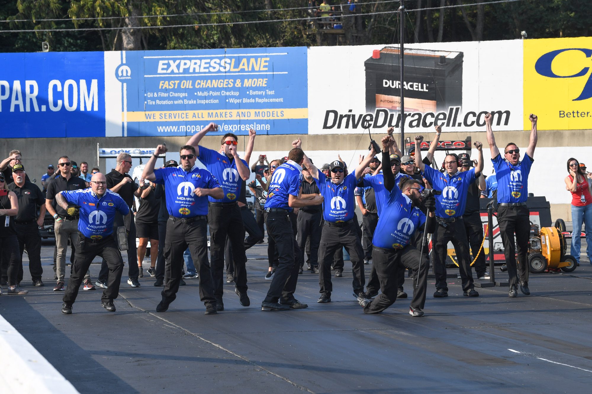 Mopar team celebrating after Tommy wins