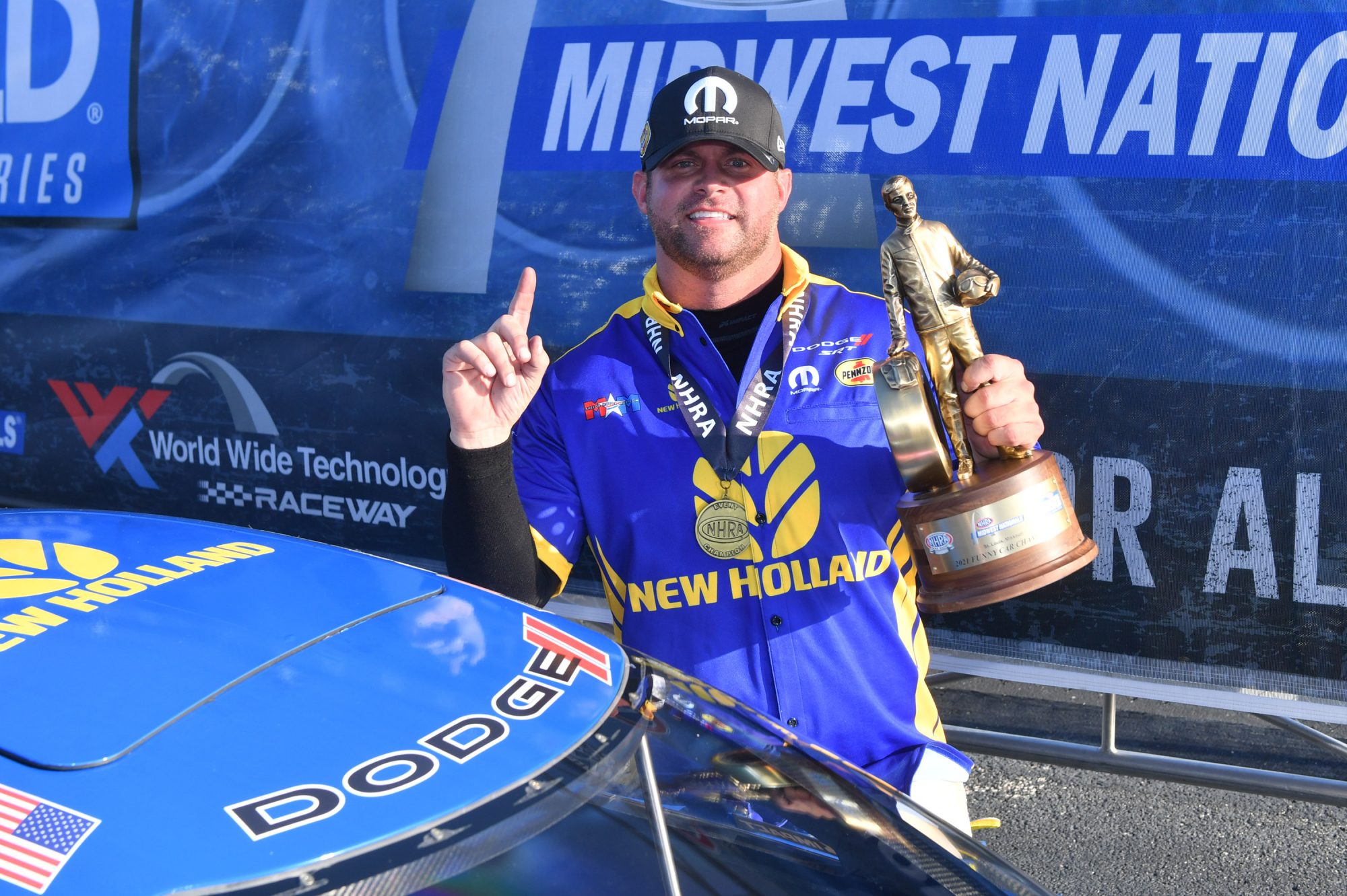 Matt Hagan holding his wally trophy