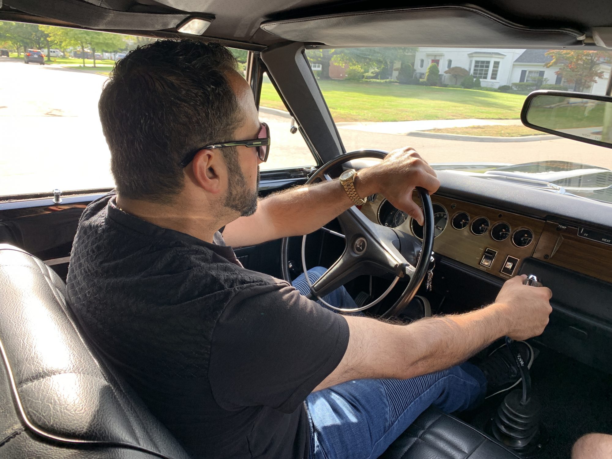 Man driving vintage Challenger