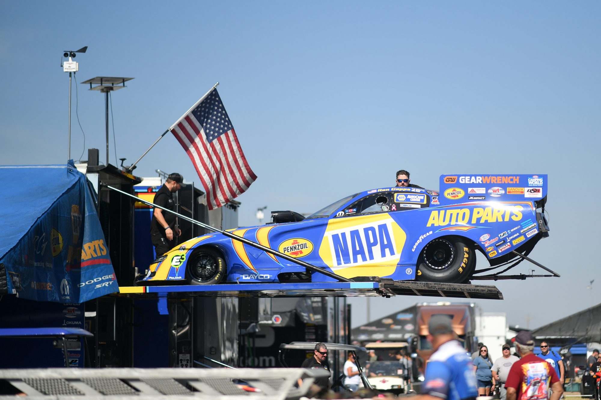 Ron Capps' car coming off the trailer