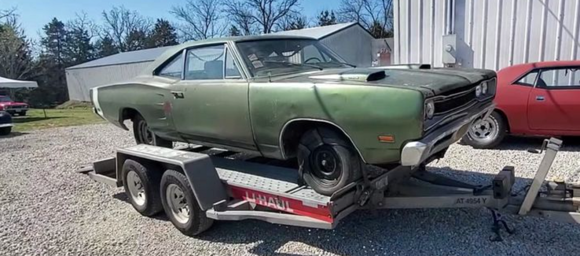 Vintage Mopar vehicle on a trailer