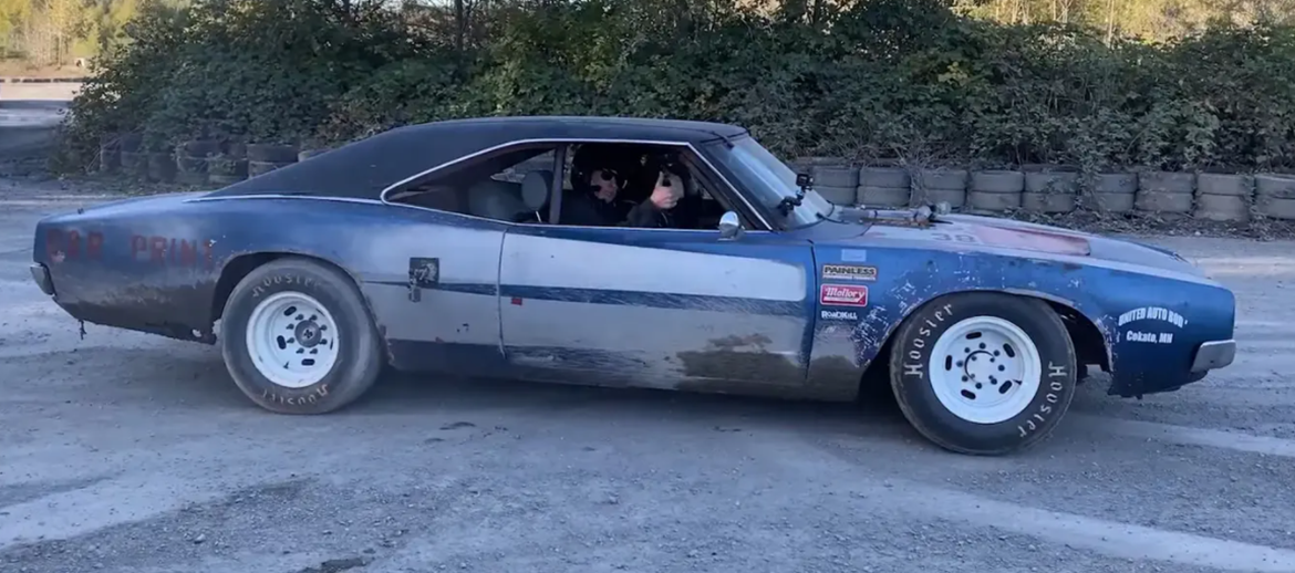 Man in a 1968 Dodge Charger