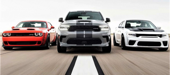 Dodge Challenger, Dodge Durango and Dodge Charger driving next to eachother
