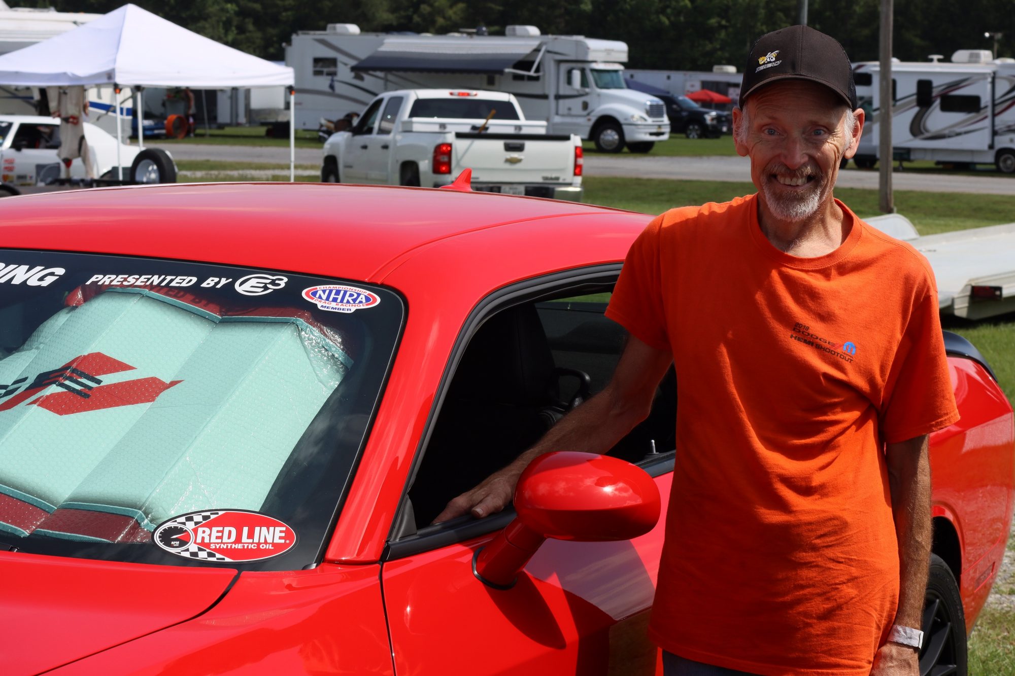 Jeff Smith standing next to his car