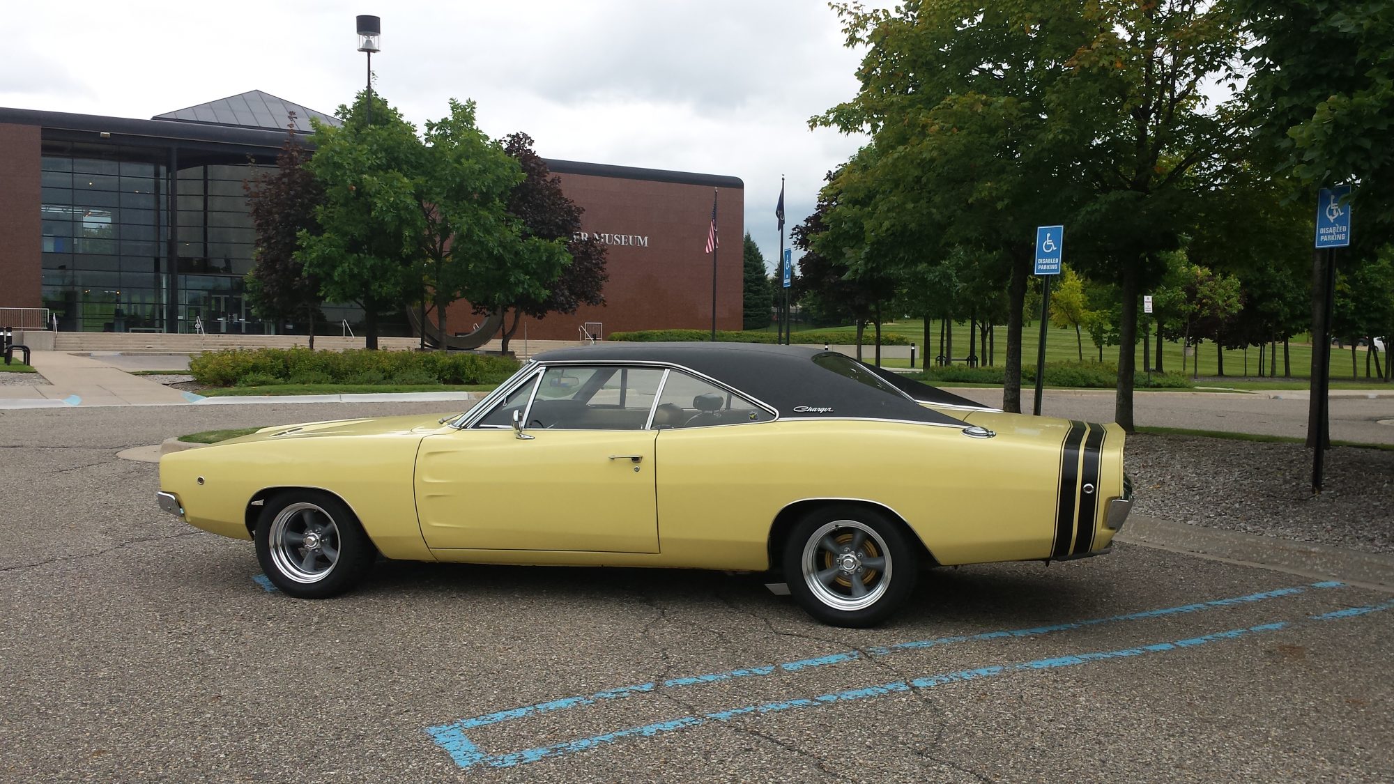 Vintage Dodge vehicle sitting in a parking lot