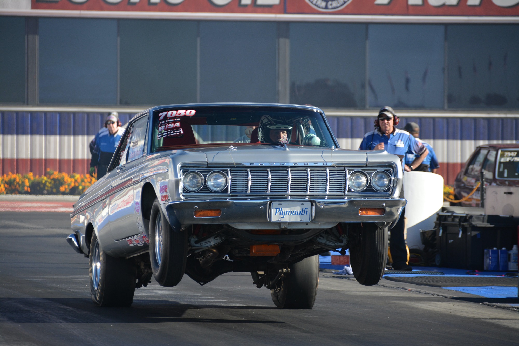 Dodge vehicle doing a wheelie