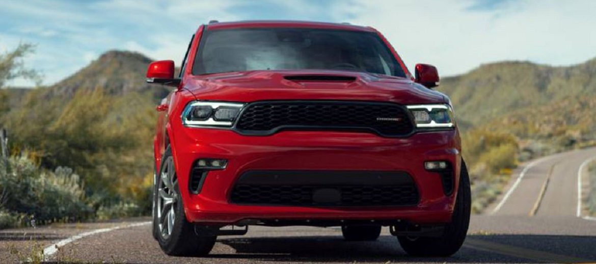 Red Dodge Durango GT driving down the road