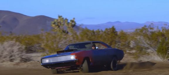 Man doing donuts in '68 Charger
