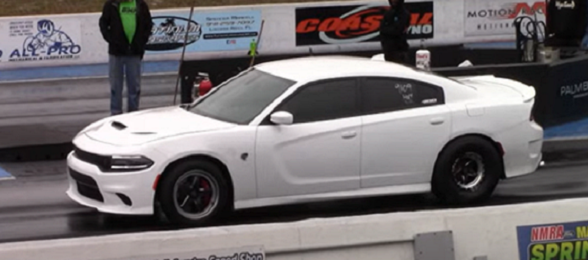 White Charger Hellcat on the drag strip