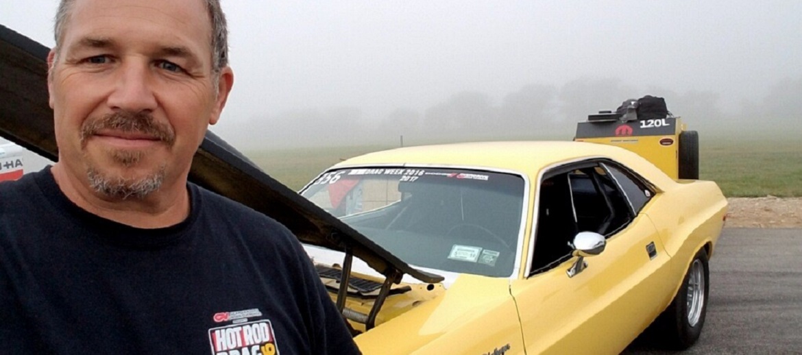 Paul Castiglione with his restored vehicle for sick week