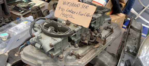 vehicle part on the table at a swap meet